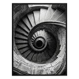 Black 18x24 Fusion frame holding a black-and-white photo of a stone spiral staircase from above 