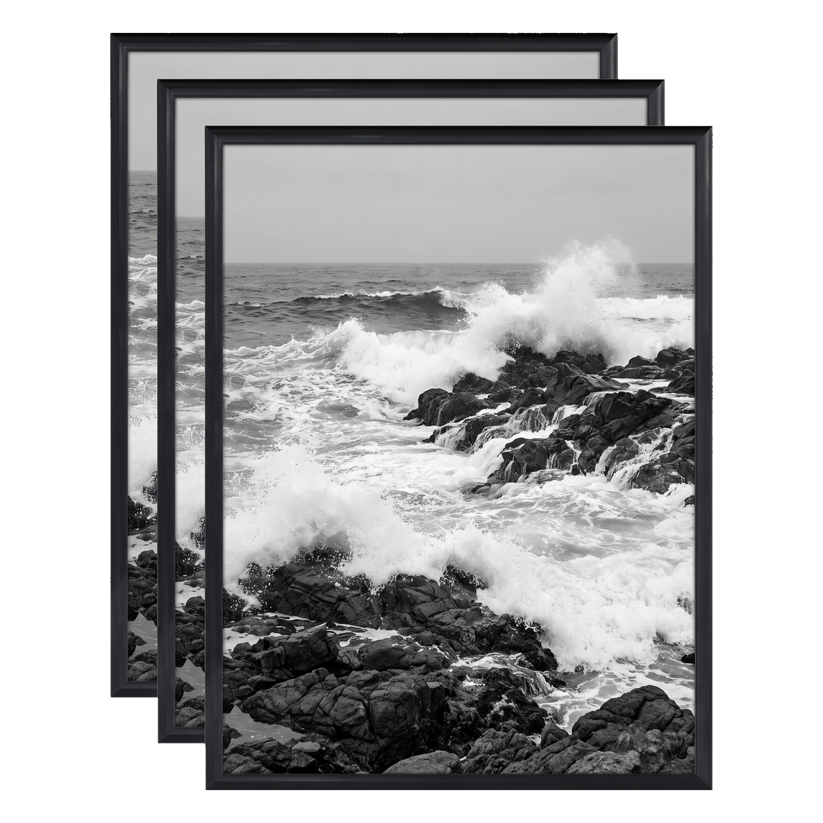 Three stacked black 11x14 Fusion frames all holding the same crashing wave photo 