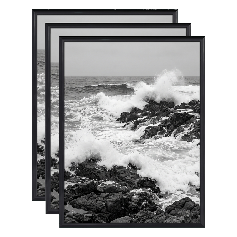 Three stacked black 11x14 Fusion frames all holding the same crashing wave photo #flat