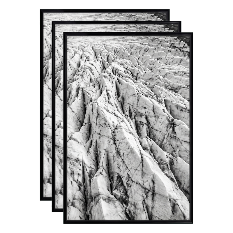 Three stacked black 12x18 Fusion frames all holding the same eroded rock ridge photo #flat