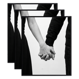 Three stacked black 16x24 Fusion frames all holding the same photo of a couple holding hands 