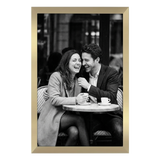 Gold Epic poster frame, 12x18, no mat, holding a black-and-white photo of a couple laughing at a cafe table 