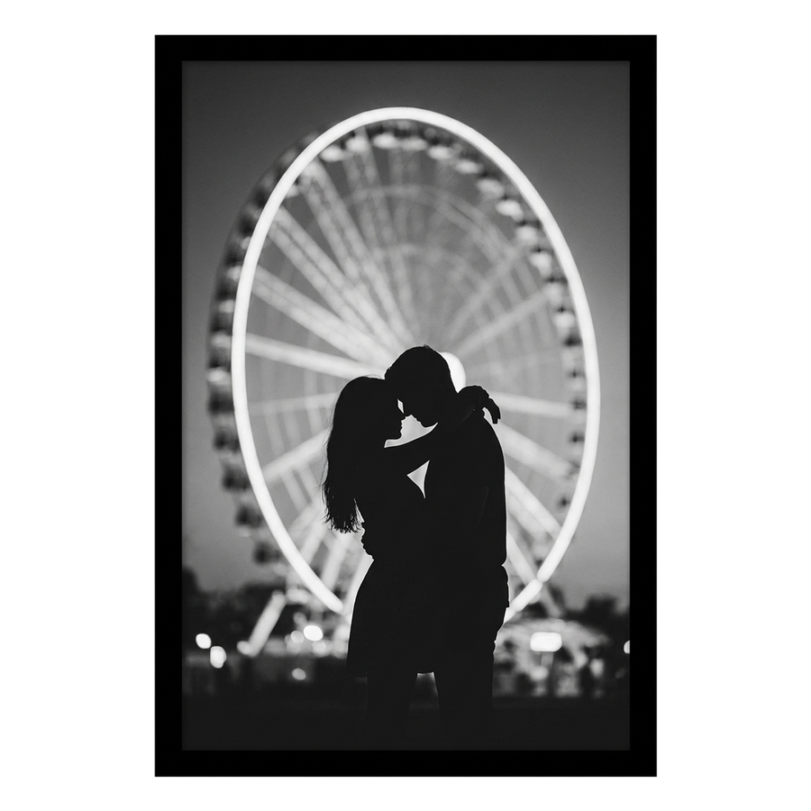 Black Epic poster frame, 14x22, no mat, holding a black-and-white photo of a couple against a Ferris wheel 