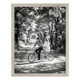 Driftwood Epic poster frame, 16x20, no mat, holding a black-and-white photo of a couple on a tandem bicycle 
