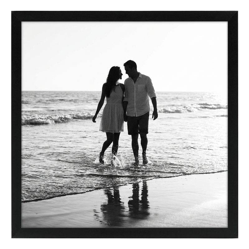Black landscape Epic poster frame, 20x20, no mat, holding a black-and-white photo of a couple wading #flat