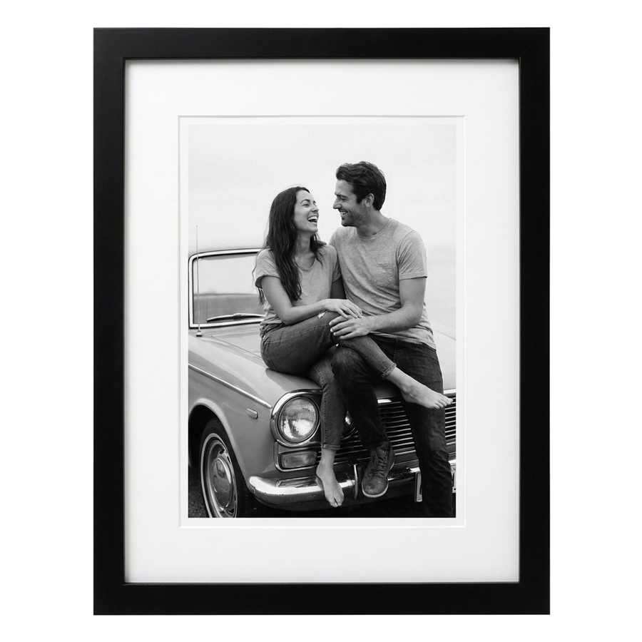 Black Epic frame, 20x24, with a white mat opening to 16x20, holding a photo of a couple on a vintage car 