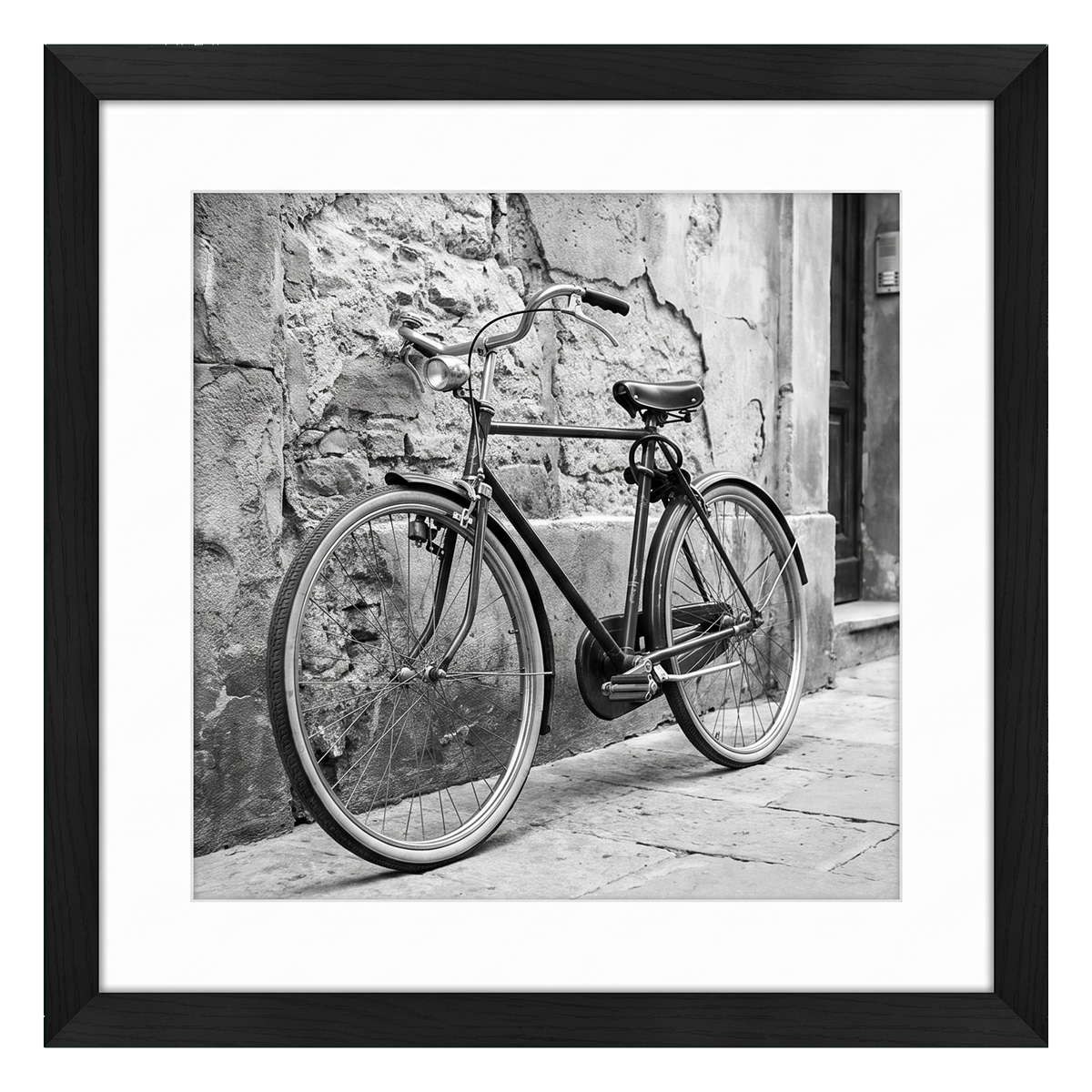 Black Hudson frame, 24x24, with a 20x20 white mat, holding a black-and-white photo of a bicycle against a stone wall 