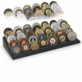 Black coin display holding rows of military challenge coins on a stepped base 