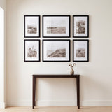 The six-frame grid hung above a narrow console table in an entryway