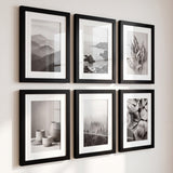 Angled view of the six-frame Galleria grid showing the slim black moulding and white mats