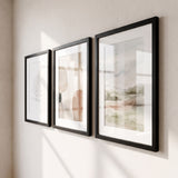 Angled view showing the slim black moulding profile and the bevelled white mat 