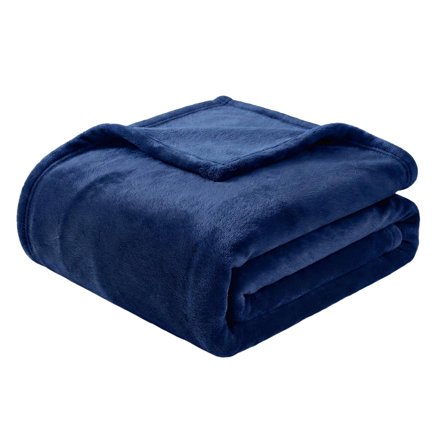 Folded navy blue blanket on a white background 