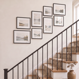 The clustered eight-frame set seen at an angle down the stairway wall