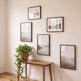 The open five-frame set seen at an angle above a console table 