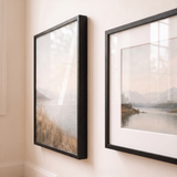 Close detail of an unmatted 12x18 beside a matted 11x14, both glazed 