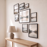 The eight-frame stair-step cluster seen at an angle above a console table