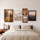 The three-tone wood set above a bed with oatmeal linen bedding 