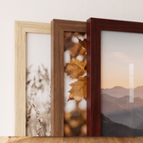 Close detail — pale oak, walnut and mahogany side by side, unmatted with the print to the wood 