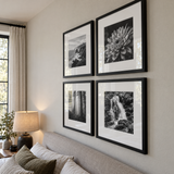 Wide Mat Quad 20x20 — Black · 4 Frames — angled view showing frame depth and glass