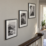 Minimal Stairway Trio (11x14) — Black · 3 Frames — angled view showing frame depth and glass