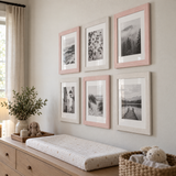 Nursery Gallery — Pink & White · 6 Frames — angled view showing frame depth and glass