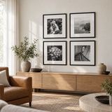 Wide Mat Quad 20x20 — Black · 4 Frames — styled in a bright living room