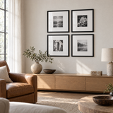 Wide Mat Quad 14x14 — Black · 4 Frames — styled in a bright living room