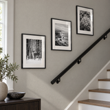 Minimal Stairway Trio (11x14) — Black · 3 Frames — styled on a grey stair wall
