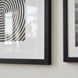 Wide Mat Trio 20x26 — Black · 3 Frames — close-up of moulding, mat and glass