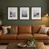 Wide Mat Trio 16x20 — Black · 3 Frames — styled in a warm evening room