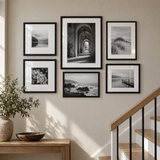 Mixed-Size Stairway Gallery — Black · 6 Frames — styled on the wall