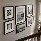 Mixed-Size Stairway Gallery — Black · 6 Frames — angled view showing frame depth and glass