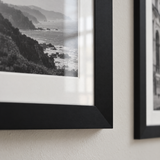 Mixed-Size Stairway Gallery — Black · 6 Frames — close-up of moulding, mat and glass
