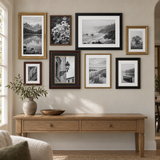Warm Collected Gallery — Black, Walnut & Gold · 8 Frames — styled on the wall
