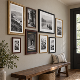 Warm Collected Gallery — Black, Walnut & Gold · 8 Frames — angled view showing frame depth and glass