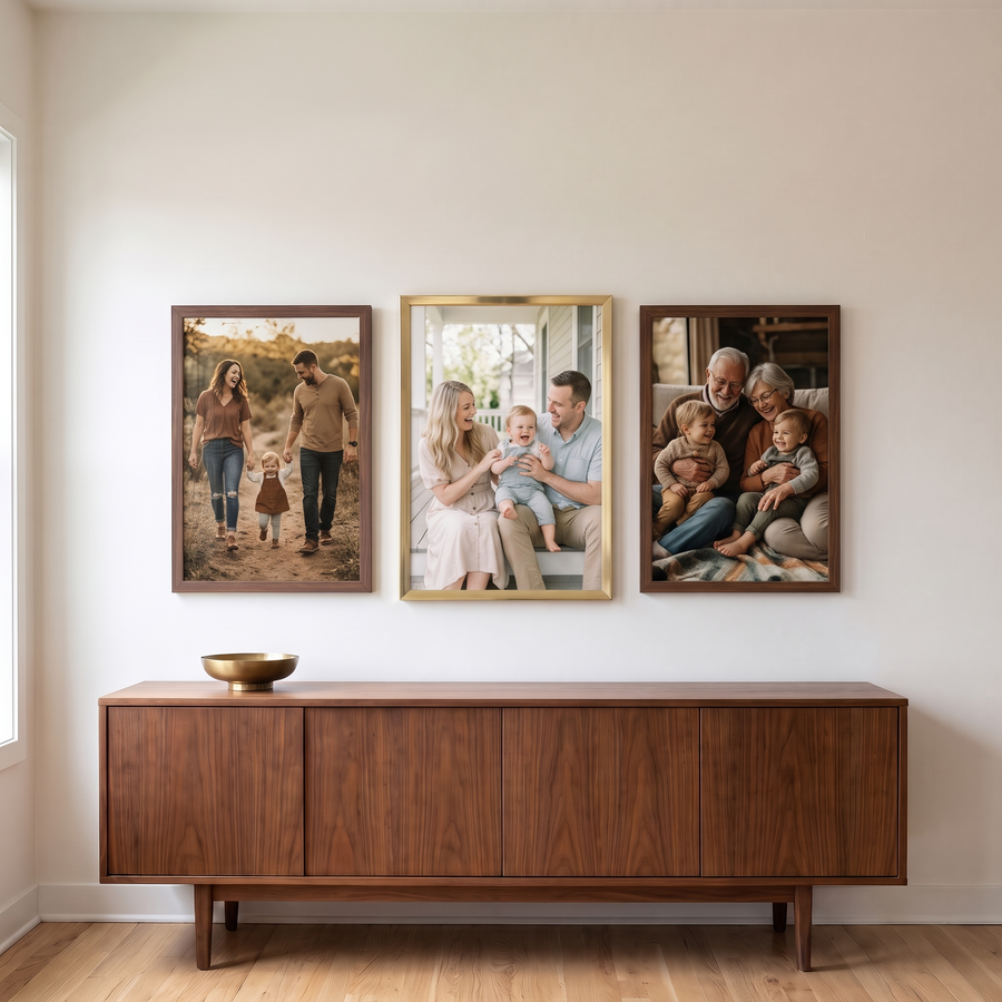 Walnut & Brass Trio: a brass 13x19 Signature frame between two walnut 12x18s, hung in one row; all unmatted. Shown in a mid-century living room, above a walnut credenza with a brass bowl, with family photos in the frames 