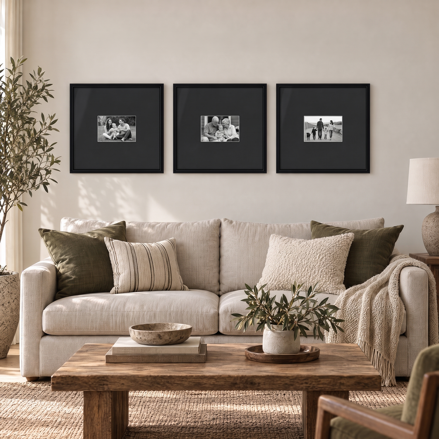 Wide Mat Trio 16x16 Black Mat — Black · 3 Frames — styled on the wall, with family photos in the frames 