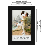 Size diagram of the black Instax frame: 2.1 by 3.4 inch glass, 1.6 by 2.9 inch opening 