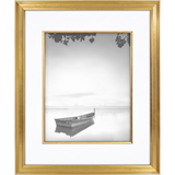 Gold Veranda frame, 16x20, with a white mat and gold fillet, holding a photo of a boat on still water 